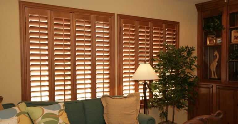 Wood shutters in San Antonio living room.